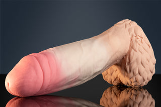 Nova The Wild Coyote side view showing natural peach and cream coloration, detailed skinfold texture and textured tan base on a reflective surface