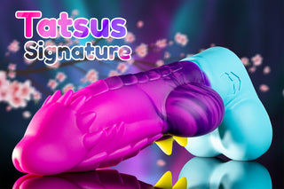 Tatsu The Spiky Dragon in Tatsu Signature Coloration with vibrant pink, purple and cyan marbling, dragon-inspired texture and fantasy design